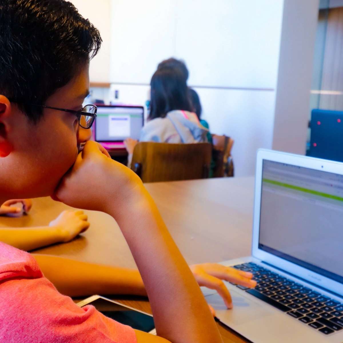 Short Courses A Tiny Code student learning vibe coding to build a web application in Hong Kong.