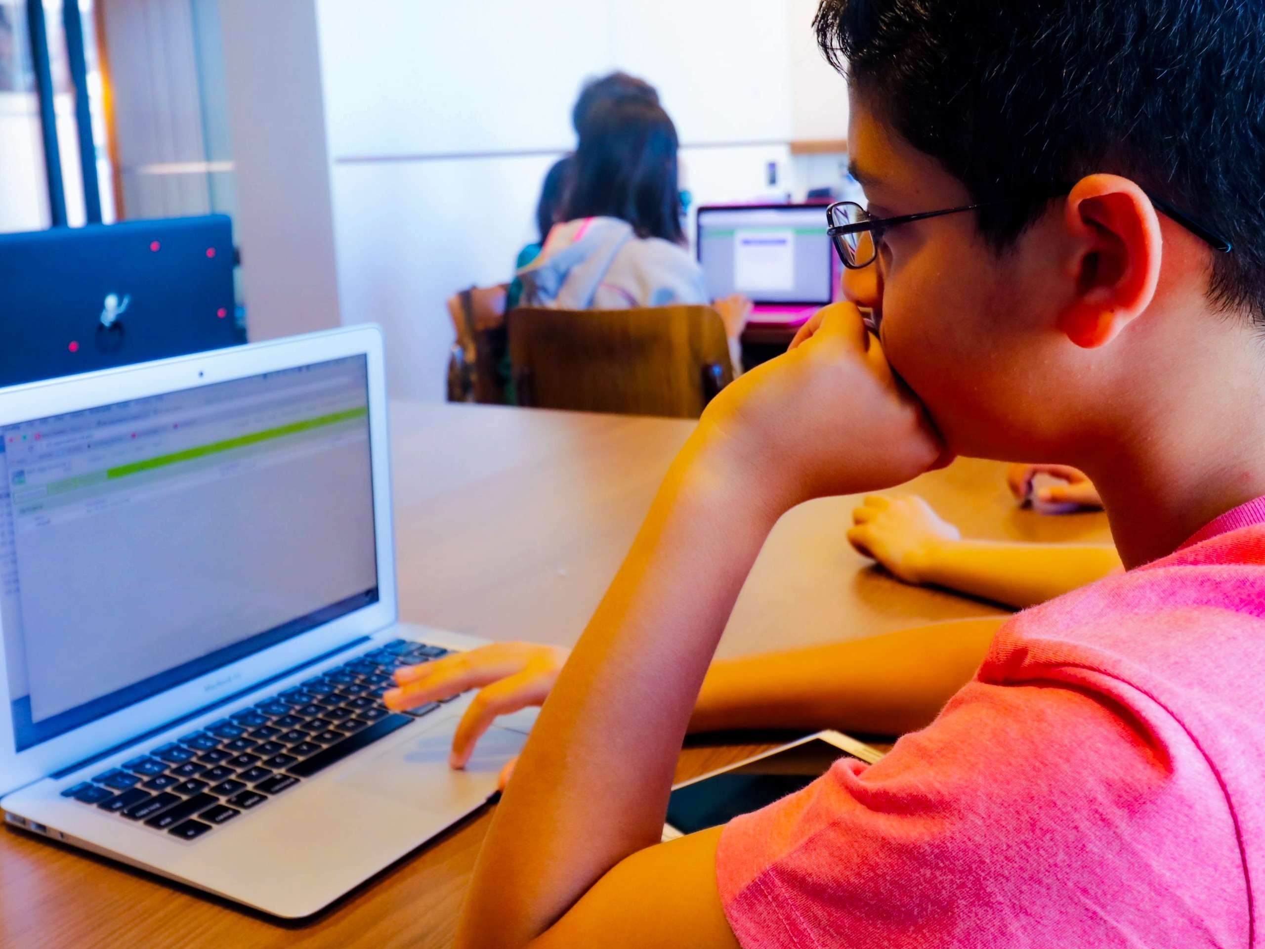Group Online Camps A student is vibe coding with AI at Tiny Code's group online summer camp 2026
