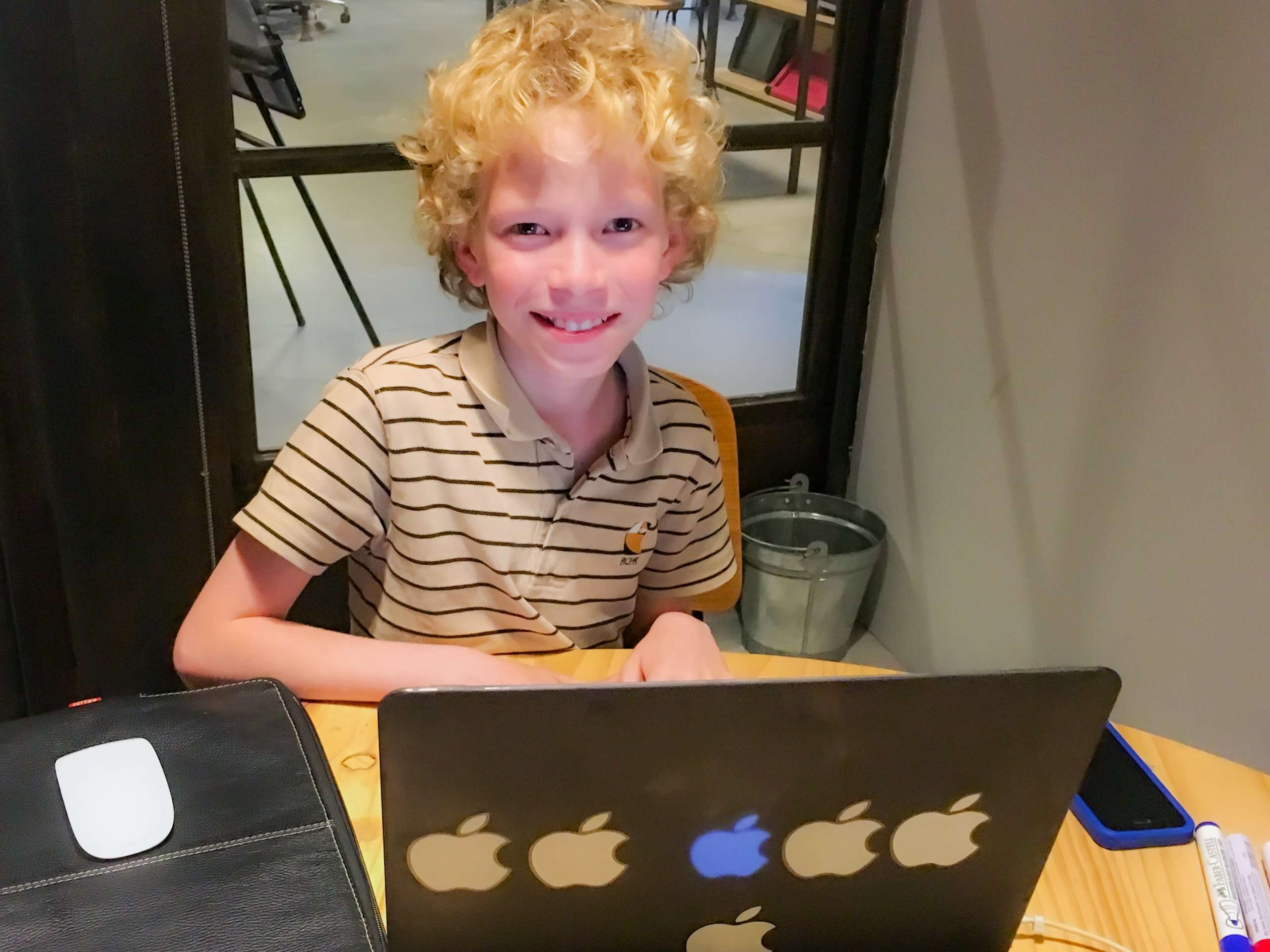 Group Online Camps A student is learning Python Programming at Tiny Code's group online summer camp 2026