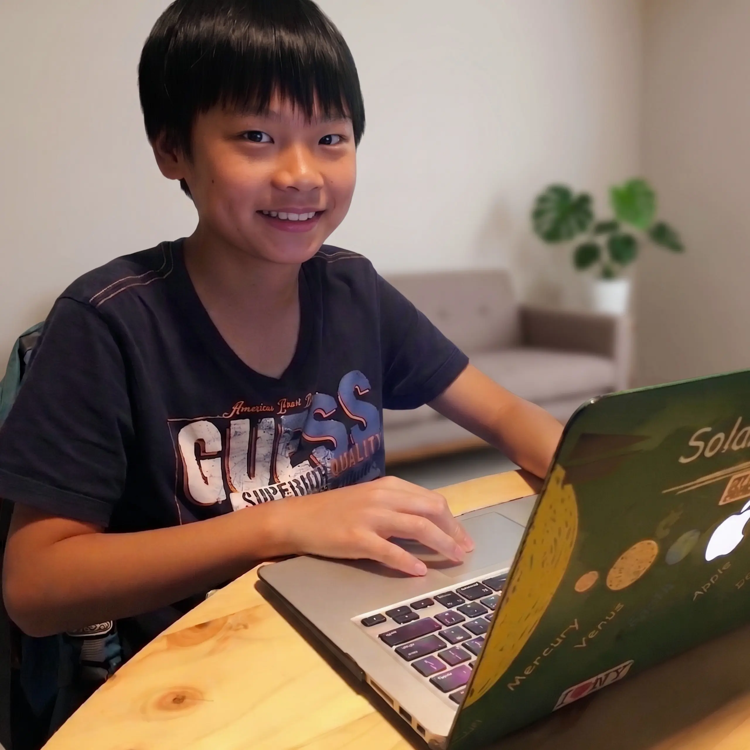 A student building a python app at a Summer Camp at Tiny Code Hong Kong